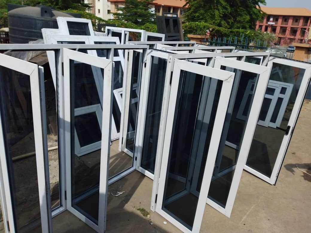 Batch of finished white aluminium casement windows