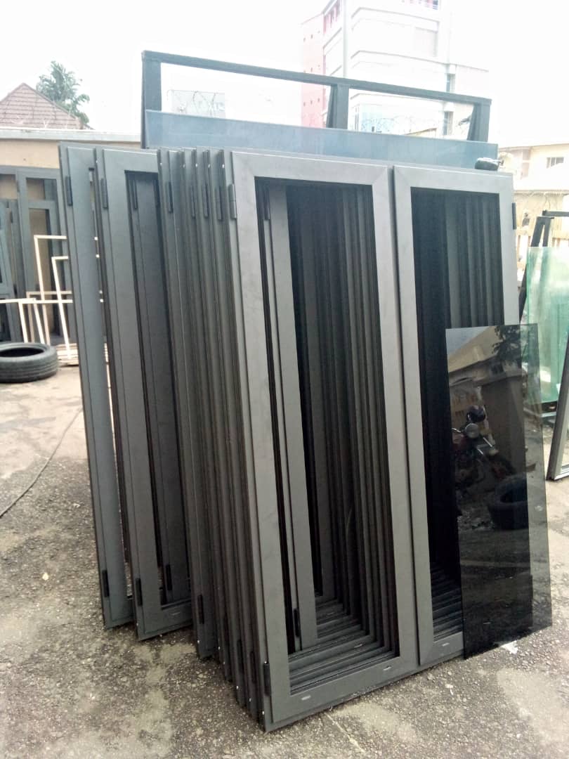Stack of grey aluminium window frames