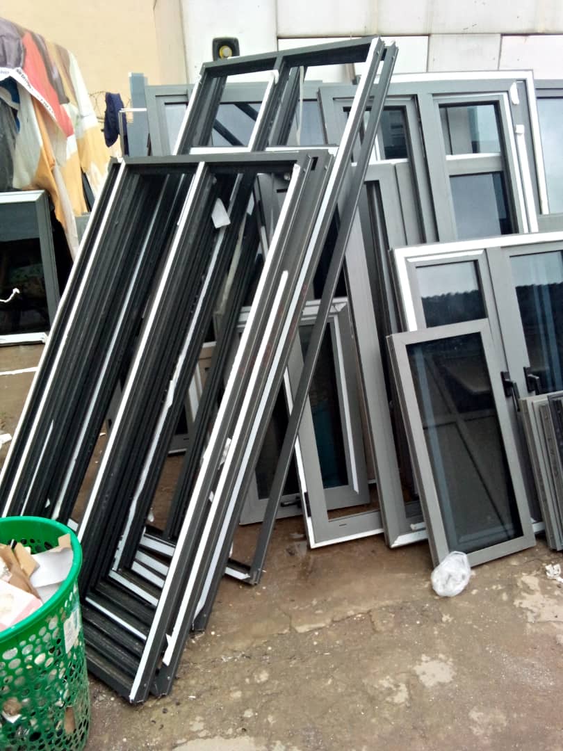 Grey aluminium window and door frames ready for fitting