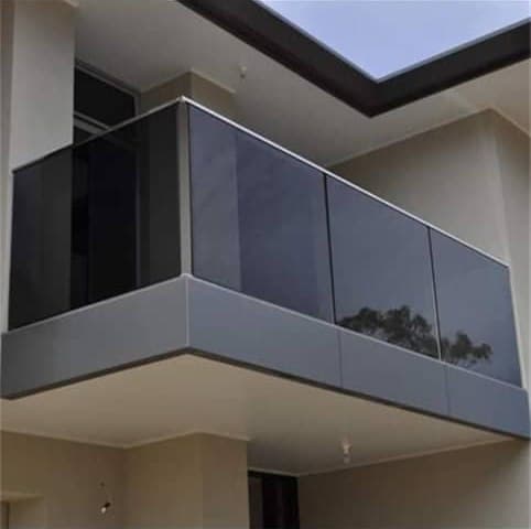 Tinted tempered-glass balcony on a modern two-storey house