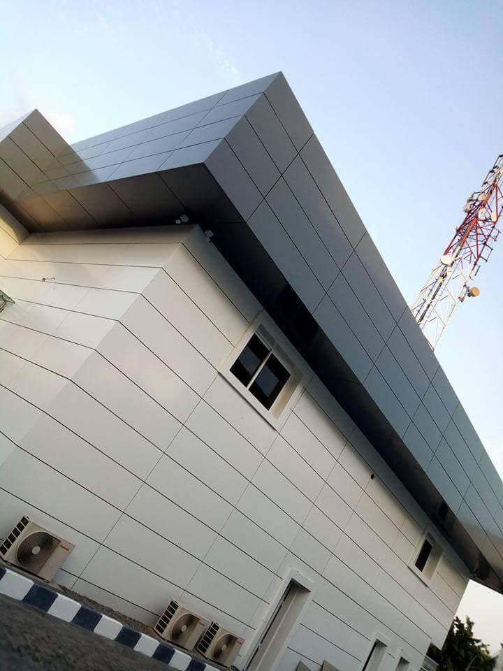 Building clad in white aluminium composite panels